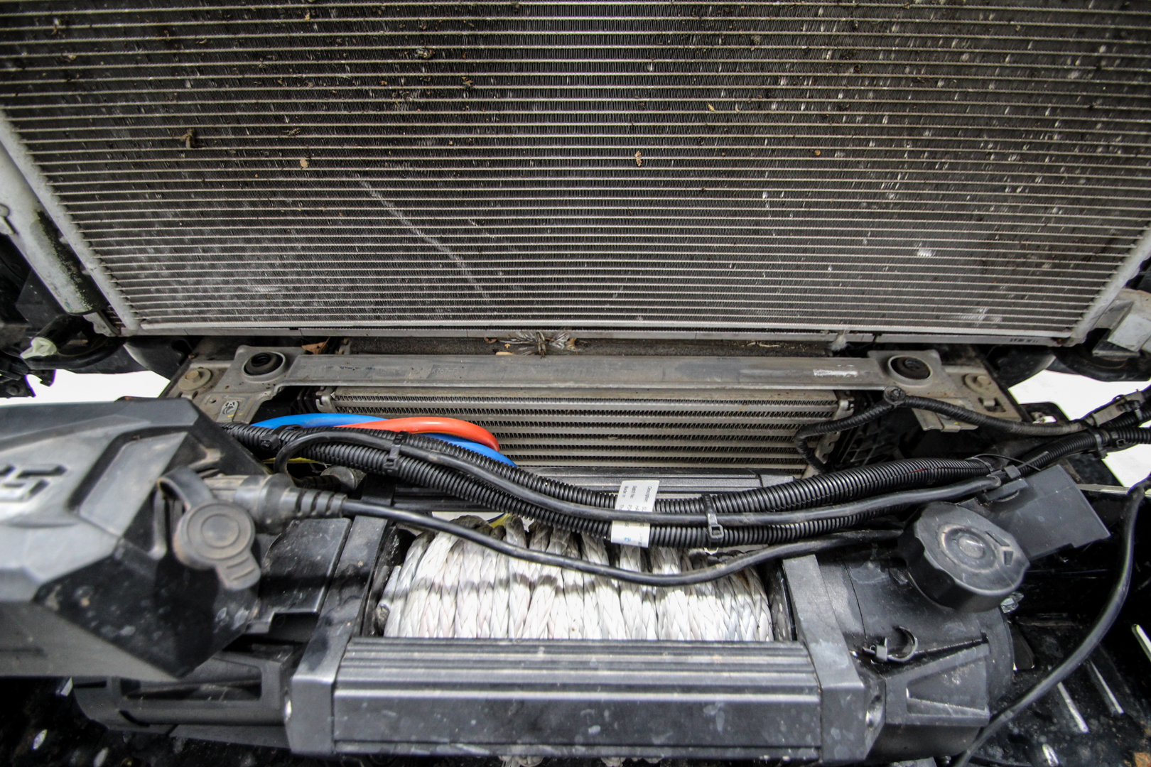 Factory intercooler on a Next Gen Ranger V6 sitting directly behind the bullbar and winch mount